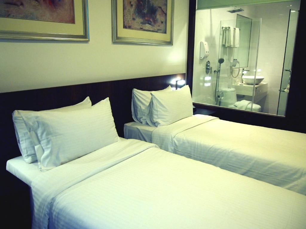 Cove D'Arena Aparthotel Singapore Rum bild